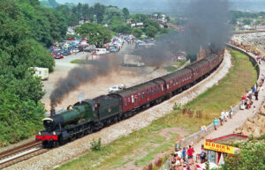 During its post-preservation mainline career, 7802 Bradley Manor is seen heading past the famous Red Rock Cafe with a southbound Torbay Express on the 10th August 2003. Photo: Martyn Tatta