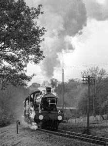 Accurately recreating the atmosphere of Cambrian steam workings of the 1960s, 7812 in Cambrian Coast Express regalia seen climbing Highley Bank during the Manor 50 weekend on 14 November 2015. Photo Joe Connell