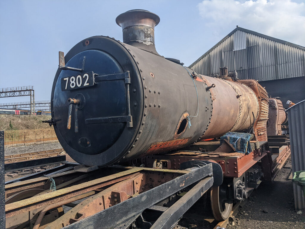 At the other end of Tyseley Works, 7802’s boiler now sits in the location occupied by 7812’s boiler until a few months ago. This boiler will be prepared for examination and non-destructive testing over the next couple of months to ascertain any work that should be undertaken while it is removed from the locomotive’s frames [Photo: Adrian Hassell]