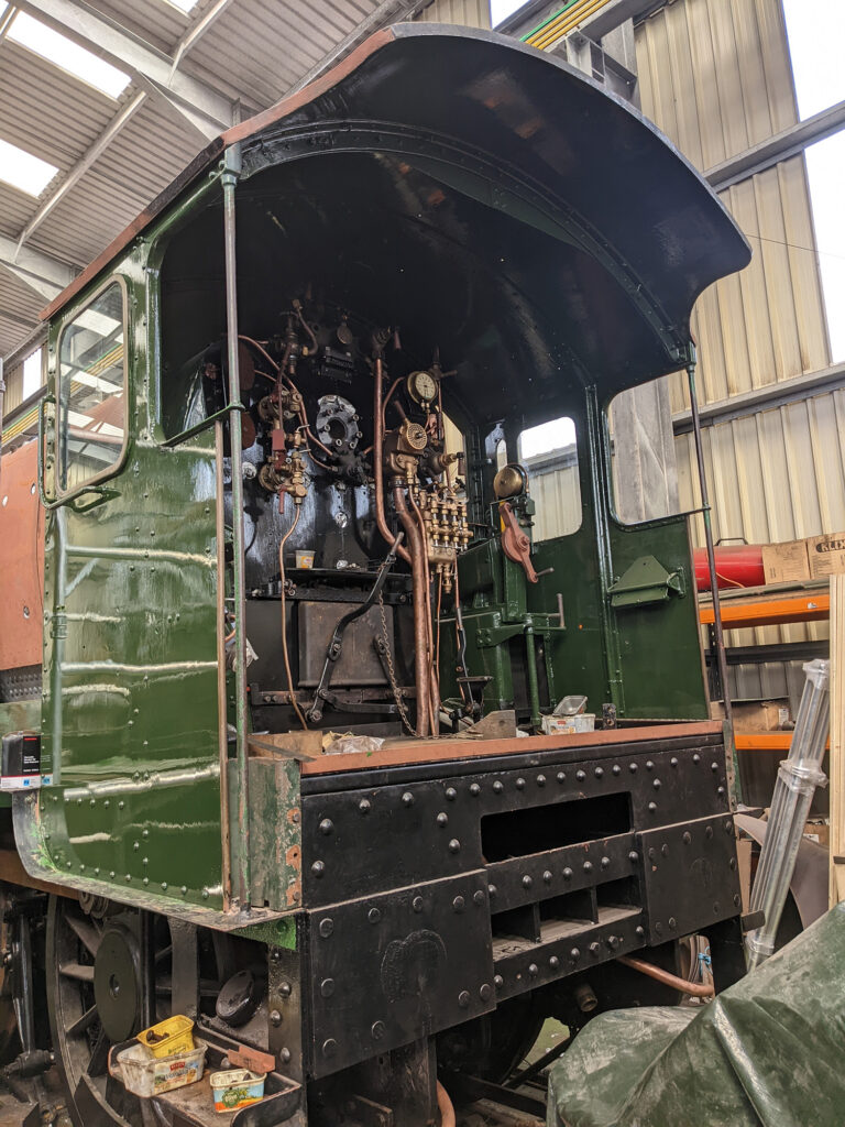 The cab area of 7812 seen on 26th April with pipework reassembly well underway and steelwork for a new cab floor laid out prior to cutting and welding. Photo: Adrian Hassell