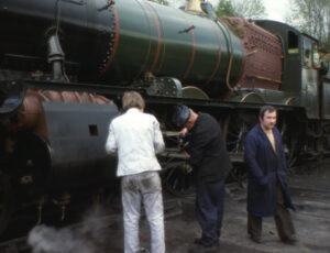 7812 at Bewdley on 22nd May 1979 at an early test steaming following initial restoration from Barry scrapyard condition. Left to right is John Hancock, EMF President and one of the Fund’s founding ‘Gang of Four’, the late Gilbert Cooke, John Giles and Joe Rosagro in the cab