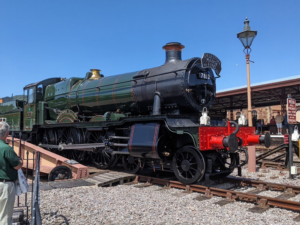 In glorious sunshine, 7812 slowly eases off the turntable at Minehead in front of gathered guests before working next trip back to Bishops Lydeard. Photo: Adrian Hassell
